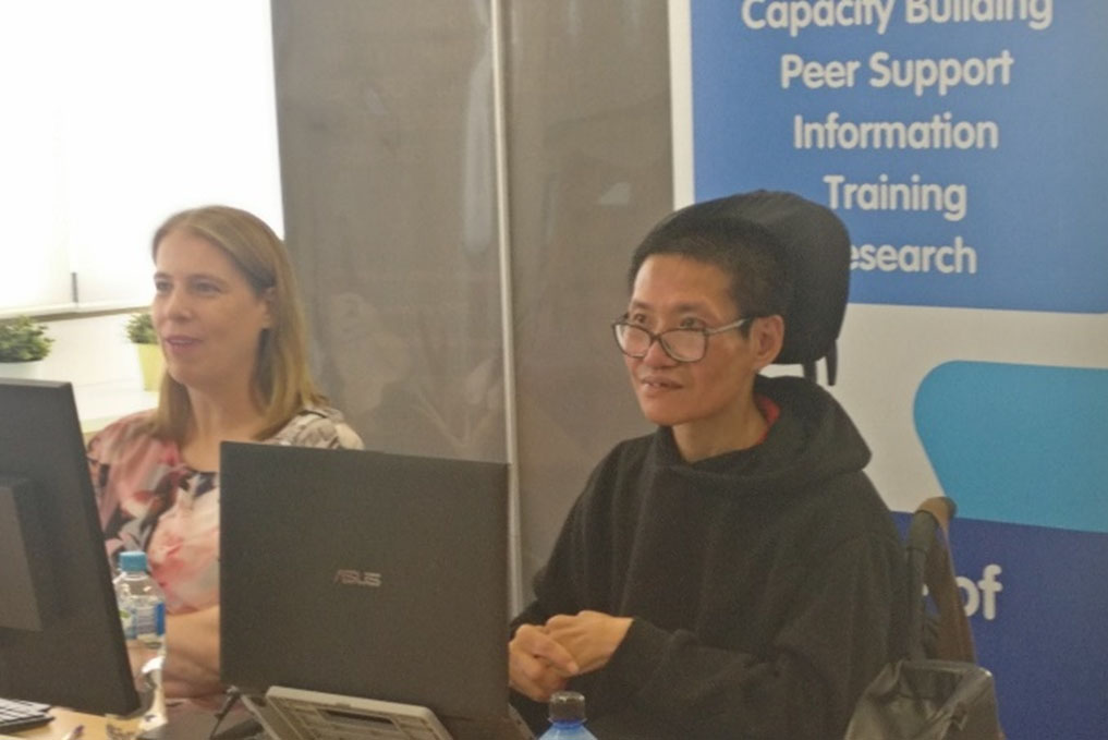 Andy and Liesl facilitating the webinar in front of computer screens.
