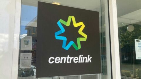 A glass window with the Centrelink logo