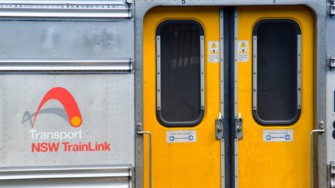 Image of a train with Trainlink logo and yellow doors