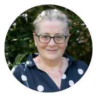El Gibbs Circle - People with Disability Australia Image of El Gibbs wearing glasses and a dark blue top with white dots
