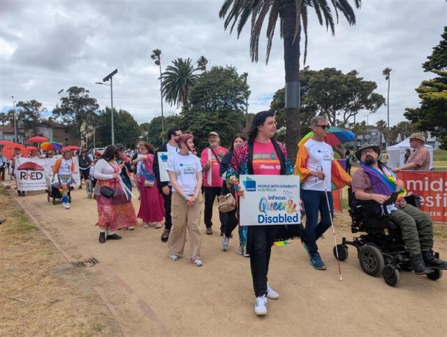 Image shows a group PWDA members participating in the Midsumma march.