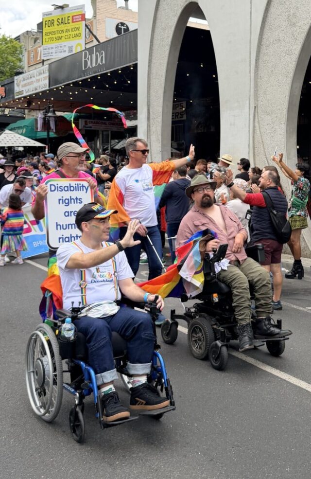 PWDA President Jeramy Hope and Vice President Jarrod Sandell-Hay with members during the Midsumma Pride March.