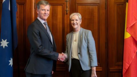 Stubbs_Edwards_tumb - People with Disability Australia Dan Stubbs shaking hands with the Hon Maree Edwards MP, Speaker of the Legislative Assembly of Victoria. After he was sworn in as Public Advocate